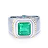 Image 2 : A 18KT WHITE GOLD AND EMERALD & DIAMONDS RING.