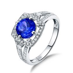 A 14KT WHITE GOLD AND TANZANITE & DIAMONDS RING.