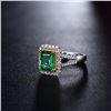 Image 4 : A 18KT WHITE GOLD AND EMERALD & DIAMONDS RING.