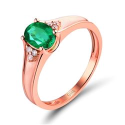 A 18KT ROSE GOLD AND EMERALD & DIAMONDS RING.