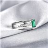 Image 5 : A 14KT WHITE GOLD AND EMERALD & DIAMONDS RING.