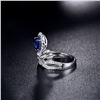 Image 4 : A 18KT WHITE GOLD AND SAPPHIRE & DIAMONDS RING.