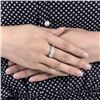 Image 6 : A 18KT WHITE GOLD AND DIAMONDS RING.