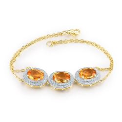 A 14KT YELLOW GOLD AND CITRINE & DIAMONDS BRACELET.