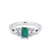 Image 2 : A 14KT WHITE GOLD AND EMERALD & DIAMONDS RING.