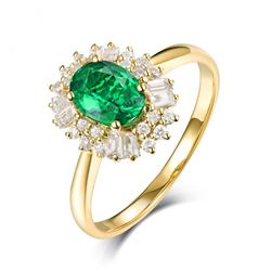 A 14KT YELLOW GOLD AND EMERALD & DIAMONDS RING.