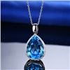 Image 3 : A 14KT WHITE GOLD AND TOPAZ & DIAMONDS PENDANT.