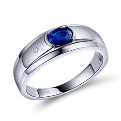 A 18KT WHITE GOLD AND SAPPHIRE & DIAMONDS MAN RING.