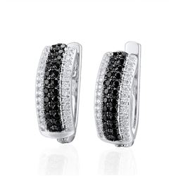 A STERLING SILVER AND CUBIC ZIRCONIA EARRINGS.