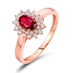 A 18KT ROSE GOLD AND RUBY & DIAMONDS RING.
