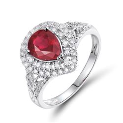 A 14KT WHITE GOLD AND RUBY & DIAMONDS RING.