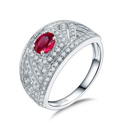 A 14KT WHITE GOLD AND RUBY & DIAMONDS RING.