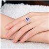 Image 5 : A 18KT WHITE GOLD AND TANZANITE & DIAMONDS RING.