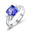 Image 1 : A 14KT WHITE GOLD AND TANZANITE & DIAMONDS RING.