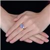 Image 5 : A 14KT WHITE GOLD AND TANZANITE & DIAMONDS RING.