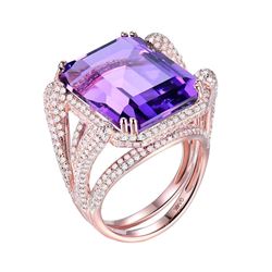 A 14KT ROSE GOLD AND AMETHYST & DIAMONDS RING.