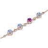 Image 2 : A 14KT ROSE GOLD AND TOPAZ & AMETHYST BRACELET.
