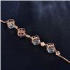 Image 4 : A 14KT ROSE GOLD AND TOPAZ & AMETHYST BRACELET.