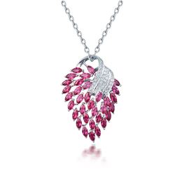 A 18KT WHITE GOLD AND RUBY & DIAMONDS PENDANT.