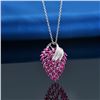 Image 3 : A 18KT WHITE GOLD AND RUBY & DIAMONDS PENDANT.