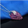 Image 4 : A 18KT WHITE GOLD AND RUBY & DIAMONDS PENDANT.