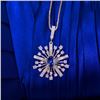 Image 2 : A 18KT WHITE GOLD AND SAPPHIRE & DIAMONDS PENDANT.