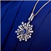 Image 4 : A 18KT WHITE GOLD AND SAPPHIRE & DIAMONDS PENDANT.
