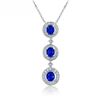 Image 1 : A 14KT WHITE GOLD AND SAPPHIRE & DIAMONDS PENDANT.