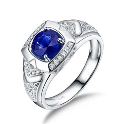 A 14KT WHITE GOLD AND SAPPHIRE & DIAMONDS MAN RING.