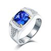 Image 1 : A 14KT WHITE GOLD AND TANZANITE & DIAMONDS MAN RING.