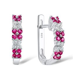 A STERLING SILVER AND CUBIC ZIRCONIA EARRINGS.