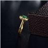 Image 5 : A 14KT YELLOW GOLD AND EMERALD & DIAMONDS RING.