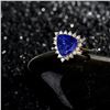 Image 3 : A 14KT YELLOW GOLD AND TANZANITE & DIAMONDS RING.