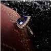Image 4 : A 14KT YELLOW GOLD AND TANZANITE & DIAMONDS RING.