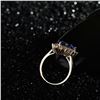Image 5 : A 14KT YELLOW GOLD AND TANZANITE & DIAMONDS RING.