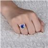Image 6 : A 14KT YELLOW GOLD AND TANZANITE & DIAMONDS RING.