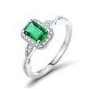Image 1 : A 18KT WHITE GOLD AND EMERALD & DIAMONDS RING.
