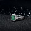 Image 4 : A 18KT WHITE GOLD AND EMERALD & DIAMONDS RING.