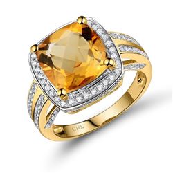 A 14KT YELLOW GOLD AND CITRINE & DIAMONDS RING.