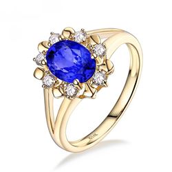 A 14KT WHITE GOLD AND TANZANITE & DIAMONDS RING.