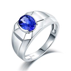 A 14KT WHITE GOLD AND TANZANITE MAN RING.