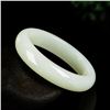 Image 1 : A NATURAL WHITE JADE BANGLE.