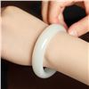 Image 4 : A NATURAL WHITE JADE BANGLE.