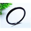 Image 1 : A NATURAL BLACK AGATE BANGLE.