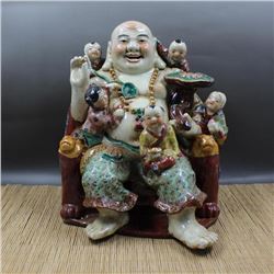 A PORCELAIN ENAMEL BUDDHA FIGURE QING DYNASTY.