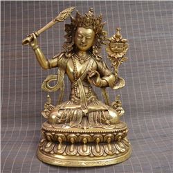 A GILT BRONZE BUDDHA FIGURE MING DYNASTY.