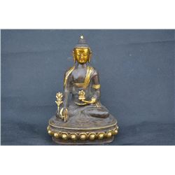 A GILT BRONZE SHAKYAMUNI BUDDHA FIGURE MING DYNASTY.