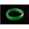 Image 2 : A NATURAL GREEN JADE BANGLE.
