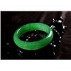 Image 3 : A NATURAL GREEN JADE BANGLE.