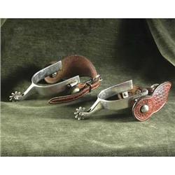 EQUESTRIAN TACK: Silvertone Kelly spurs with 10-point rowels and tooled basketweave leather straps.